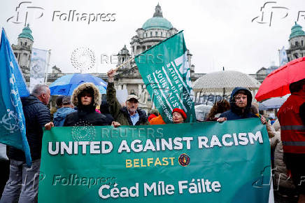 FILE PHOTO: Rally calling for an end to violence and hate following riots over an alleged sexual assault on a teenage girl, in Belfast