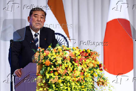 Japan's Prime Minister Ishiba delivers a speech at the India-Japan Economic Forum in Tokyo