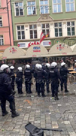 Police stands guard during clashes between Chelsea FC and Real Betis soccer fans, ahead of Conference League final in Wroclaw