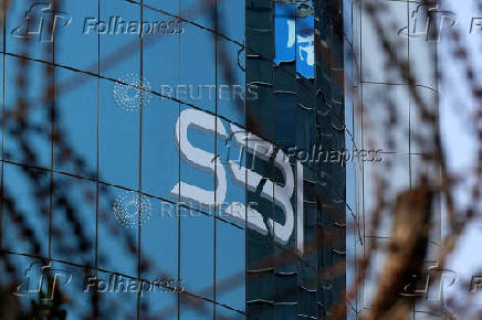 FILE PHOTO: The logo of Securities and Exchange Board of India is seen on its headquarters in Mumbai