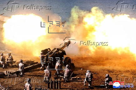 North Korean leader Kim Jong Un oversees firing contest among artillery units of the Korean People's Army