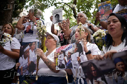 Relatives of detained Venezuelans, walk to the Miraflores presidential palace, in Caracas