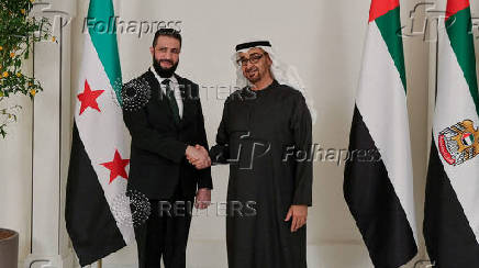FILE PHOTO: Syrian President Ahmed al-Sharaa meets UAE's President Sheikh Mohamed bin Zayed Al Nahyan, in Abu Dhabi