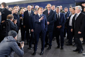 Emmanuel Macron, Keir Starmer and Friedrich Merz arrive at Kyiv railway station