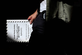 People vote in the primary election in New York