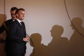 Macron hosts decoration ceremony for restorer of Notre-Dame Cathedral
