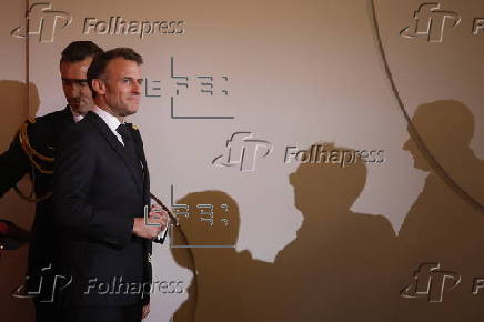 Macron hosts decoration ceremony for restorer of Notre-Dame Cathedral