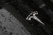 The logo of Tesla is seen on a Tesla car in Brussels