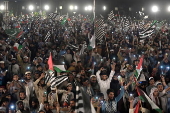 Supporters of Islamic organization Jamiat Ulema-e-Islam rally in Lahore in solidarity with Palestinians