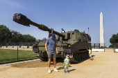Helicopters and other heavy equipment staged for DC military parade