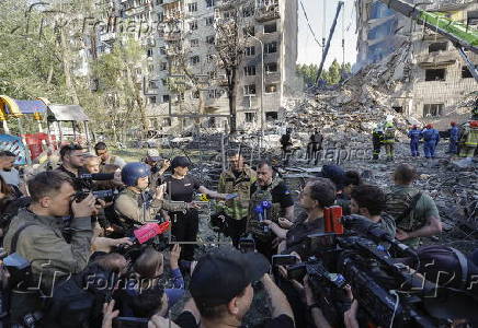 Over a dozen killed in Kyiv after overnight Russian attack