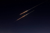 Missiles launched from Iran towards Israel are seen from Hebron