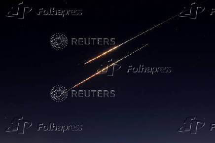 Missiles launched from Iran towards Israel are seen from Hebron