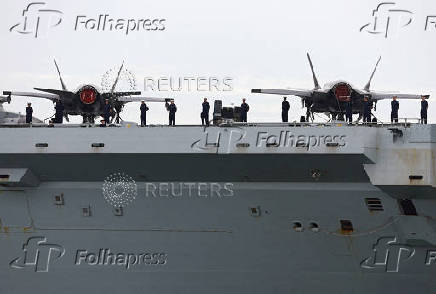 The HMS Prince of Wales warship arrives at Marina Bay Cruise Center in Singapore