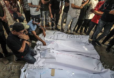Mourning the dead at Al Shifa hospital