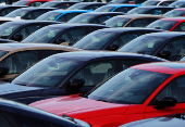 Honda vehicles are lined up at a vehicle storage yard at an industrial port in Yokohama