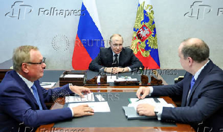 Russian President Vladimir Putin meets with VTB Bank President and Chairman of the United Shipbuilding Corporation Management Board Andrey Kostin and United Shipbuilding Corporation Director General Andrei Puchkov, in Severodvinsk