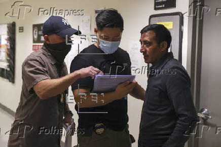 Federal Agents conduct arrests at the immigration court