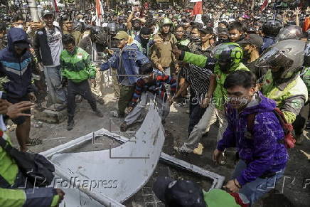 Motorcycle driver's death sparks protests in Jakarta