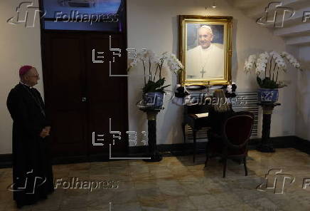 People sign condolence book at Vatican embassy in Bangkok following Pope Francis's death