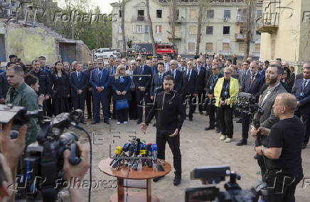 Ukrainian President Zelensky visits site of Russian missile strike in Kyiv