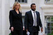 U.S. Attorney General Pam Bondi and FBI Director Kash Patel make an announcement at a press conference in Washington, D.C.