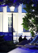 Polish police secure an earea at the Warsaw University after an attack with an axe