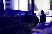 Polish police secure an earea at the Warsaw University after an attack with an axe