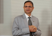 Reserve Bank of India (RBI) Governor Sanjay Malhotra arrives at a press conference in Mumbai