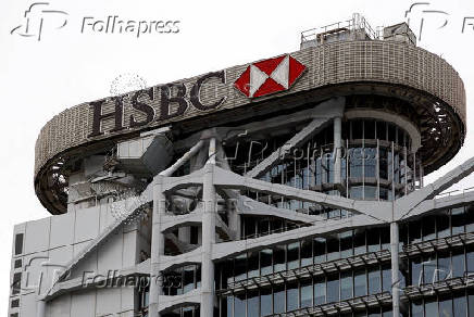 FILE PHOTO: FILE PHOTO: Logo of HSBC is seen on its headquarters at the financial Central district in Hong Kong