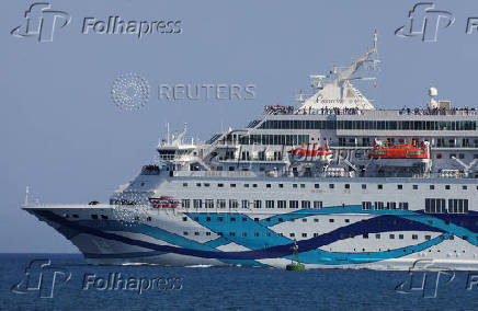 Cruise ship Crown Iris, which assists in the departure of Israelis from Cyprus, departs the port, as seen from Limassol