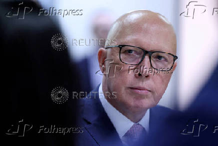 FILE PHOTO: Liberal Party leader Peter Dutton listens during a visit to youth mental health foundation in Western Sydney