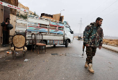 FILE PHOTO: Former Assad regime officers vacate homes for incoming rebel families