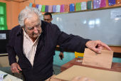 Presidential election run-off between centre-left candidate Orsi and ruling conservative coalition candidate Delgado, in Uruguay