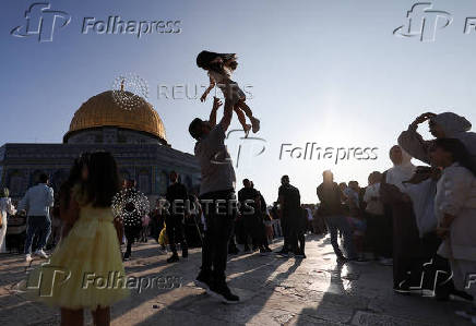 Palestinians pray on the first day of the Muslim holiday of Eid al-Adha, in Jerusalem's Old City