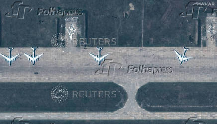 FILE PHOTO: A satellite image shows a group of TU 95 aircrafts before a drone strike, in Belaya airbase