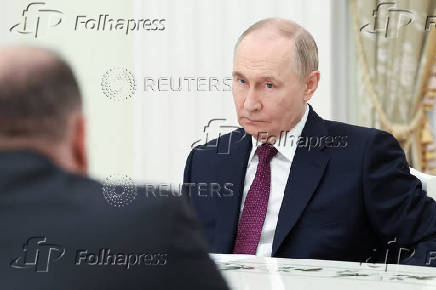 Russian President Vladimir Putin meets with Iranian Foreign Minister Abbas Araqchi in Moscow