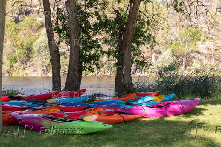 Indigenous youth kayakers paddle down the Klamath river