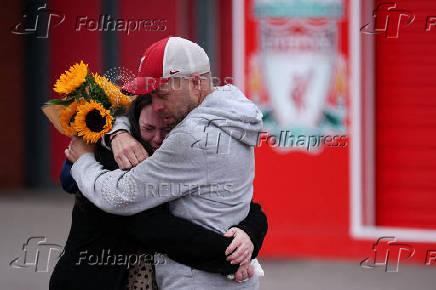 Fans pay their respects to late soccer player Diogo Jota, at Anfield Stadium in Liverpool