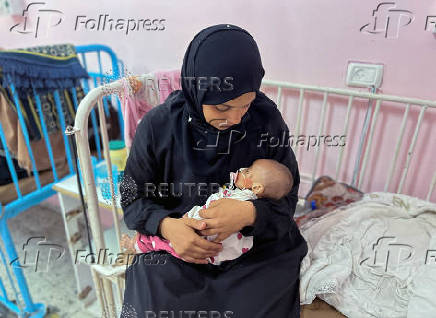 Zainab Abu Haleeb, a five-month-old Palestinian girl diagnosed with malnutrition, according to medics, receives treatment at Nasser hospital in Khan Younis, in the southern Gaza Strip