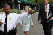 U.S. Education Secretary McMahon is escorted off the West Wing driveway by the U.S. Secret Service at the White House in Washington