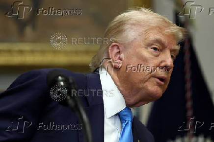 U.S. President Trump signs the VA Home Loan Program Reform Act at the White House in Washington, D.C.