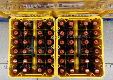 Bottles of Belgian beer Jupiler are displayed for sale at a supermarket in Sint-Pieters-Leeuw