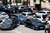 French taxi drivers protest near the Bercy Economy and Finance Ministry in Paris