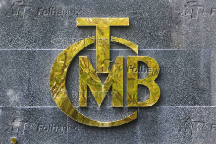 FILE PHOTO: A logo of Turkey's Central Bank is pictured at the entrance of its headquarters in Ankara