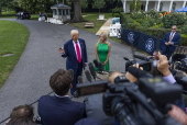 President Trump responds to questions from the media as he departs for Pennsylvania