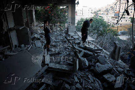 Israeli army demolishes the house of a Palestinian assailant, in Hebron
