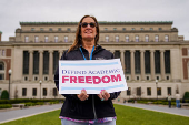 Members of Columbia Medical staff and faculty protest against federal funding cuts at Columbia University in New York