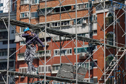 FILE PHOTO: A person works at a construction site in New Taipei City