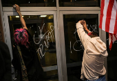 Rally in solidarity with Los Angeles protests against federal immigration sweeps, in Austin